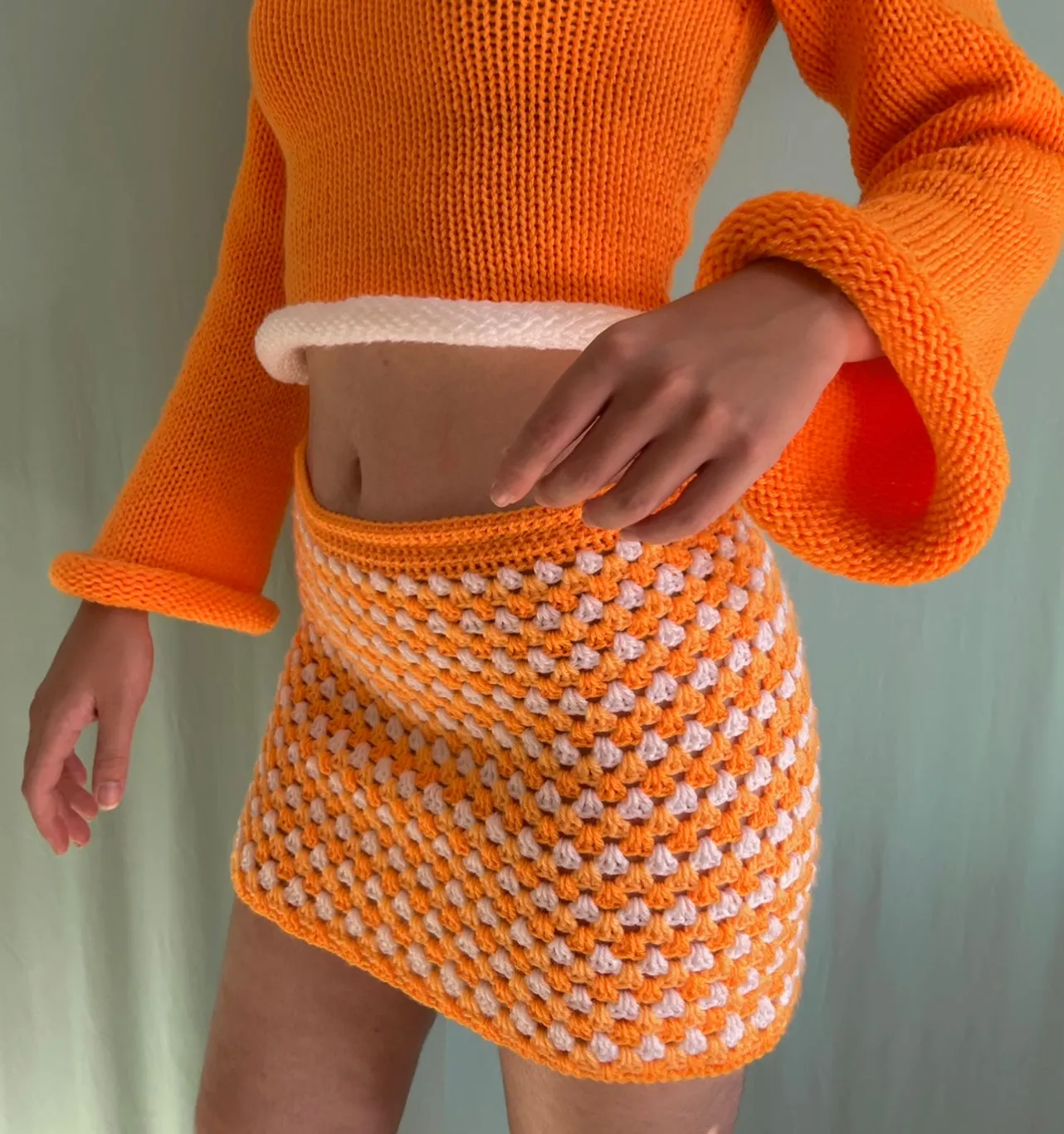 Handmade retro crochet mini skirt in orange and white